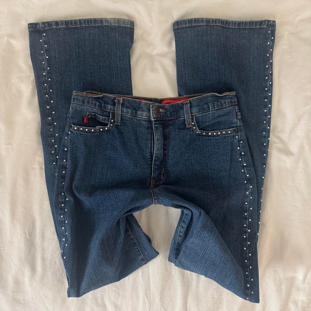 Y2K NYDJ low rise bootcut jeans with silver studs along the outer seams